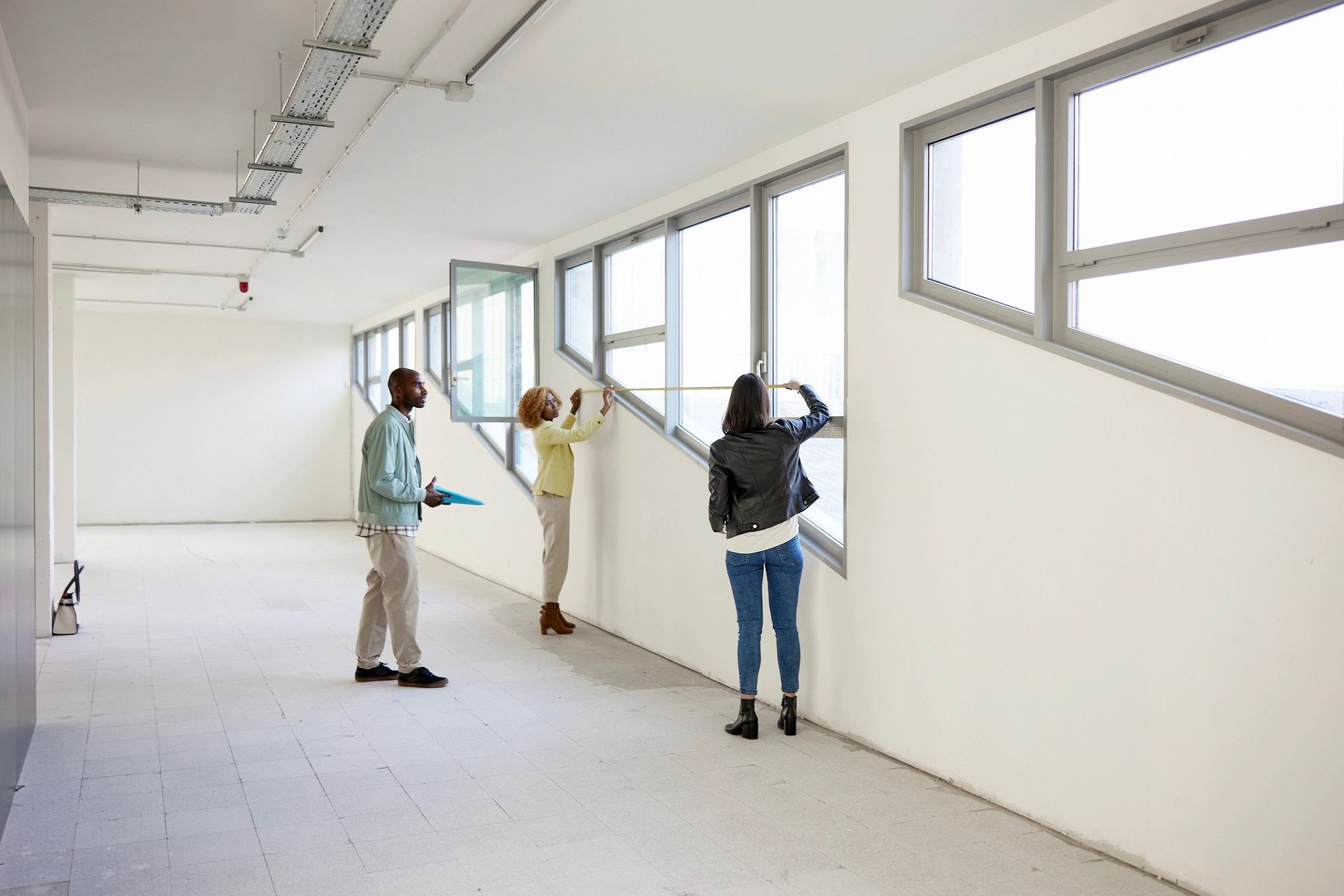 Commercial real estate professionals reviewing a property